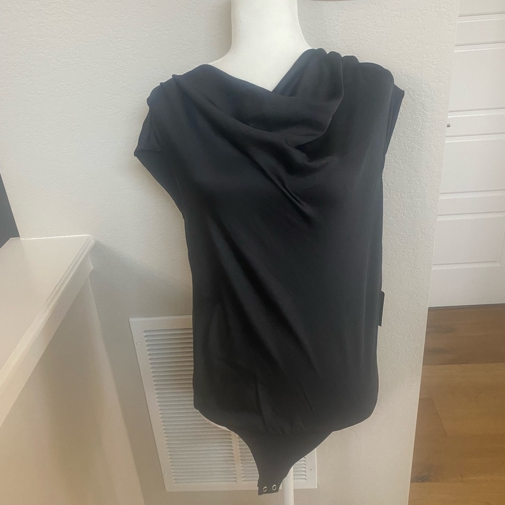 Express silk body suit. New with tags.